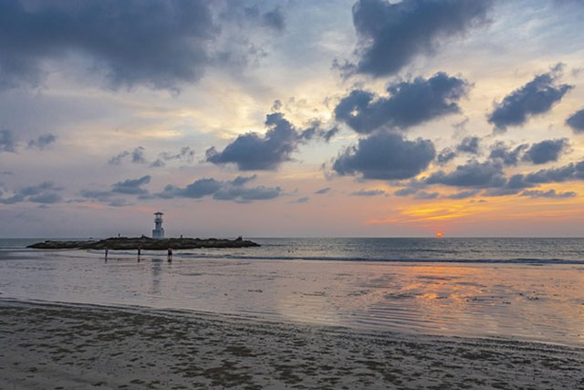 A sunny Asia-Pacific coastline illustrating regional climate and clean-energy transition themes.
